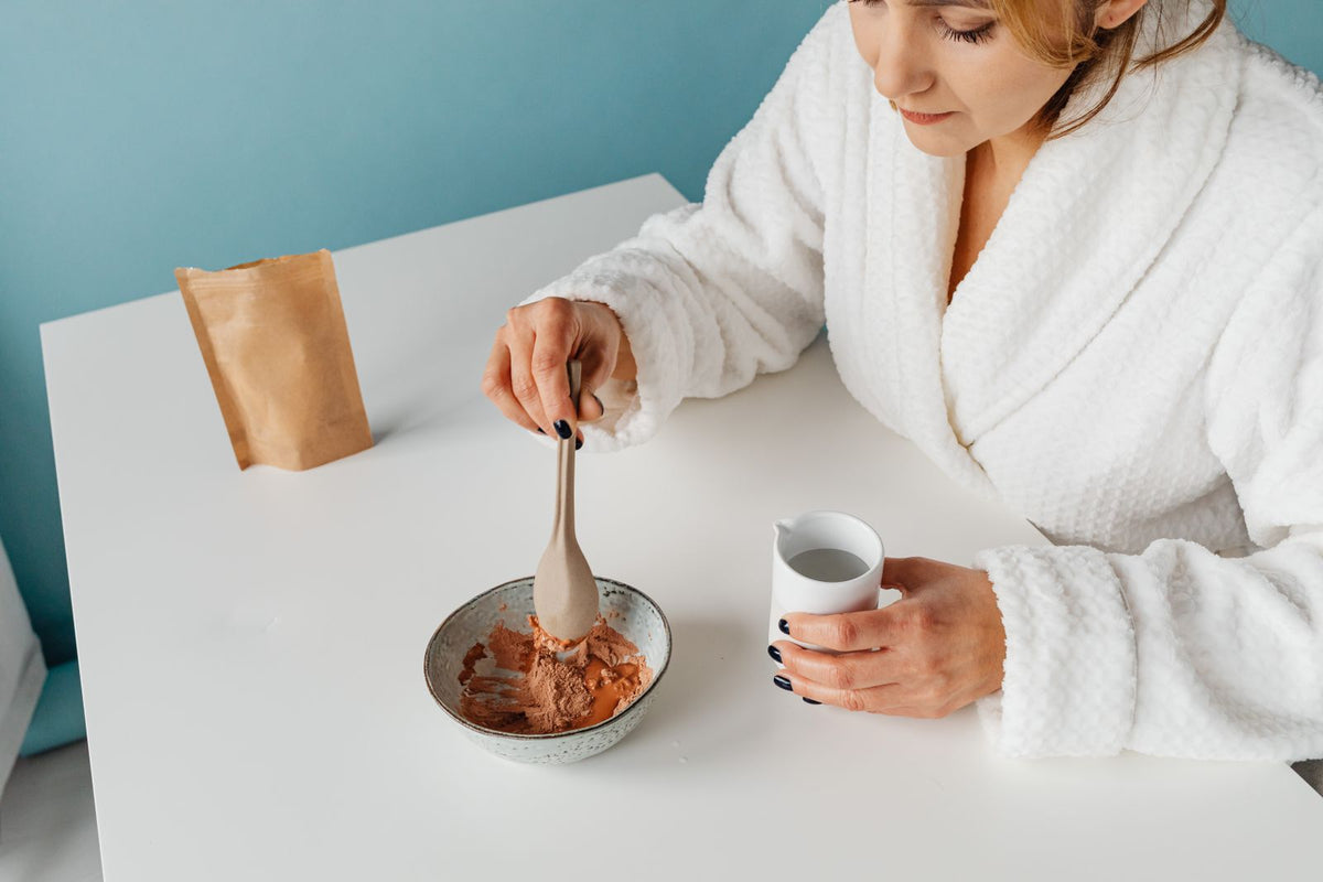 Mixing a clay face mask with water